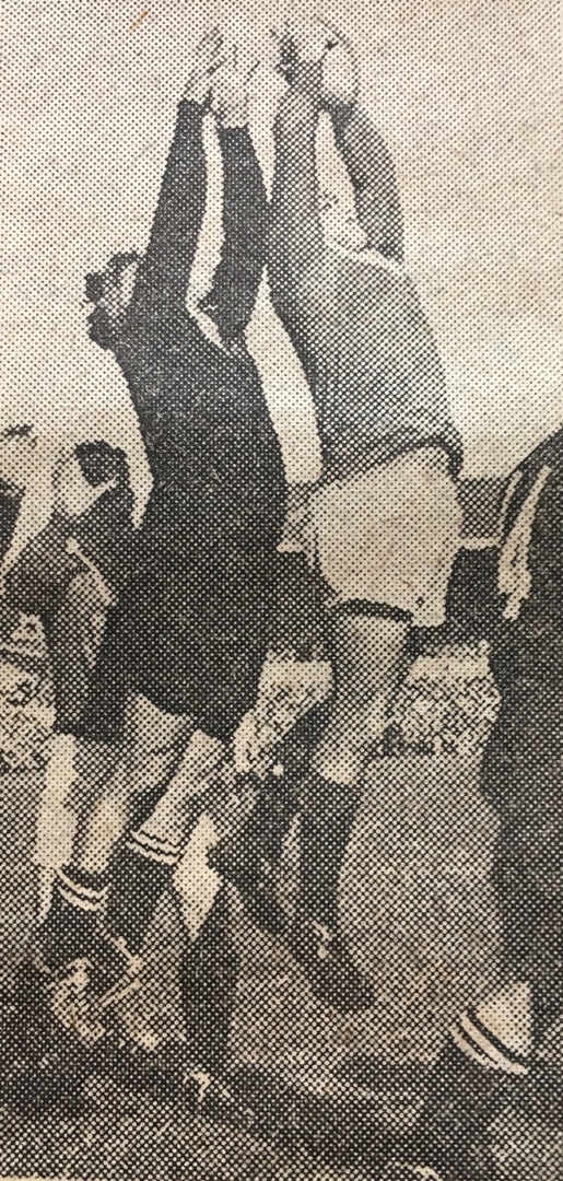 Nevan MacEwan contesting a line-out with Roddy Evans, 1959